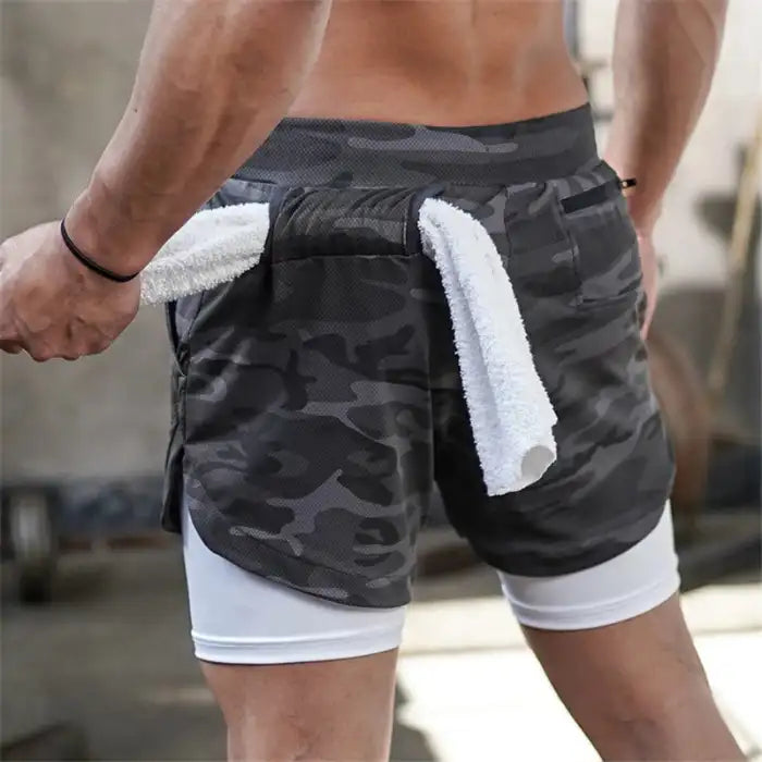 Gray camo pocket compression shorts with towel loop and white inner lining, made for gym use.