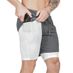 Pocket compression shorts in gray with white inner lining and phone pocket, ideal for gym training.