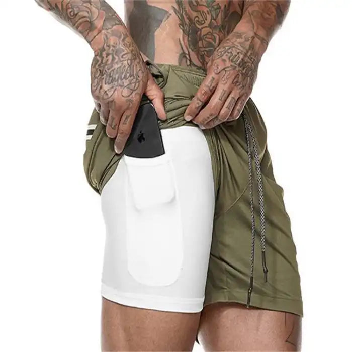  Green and white pocket compression shorts with stretch phone pouch, great for sports and training.
