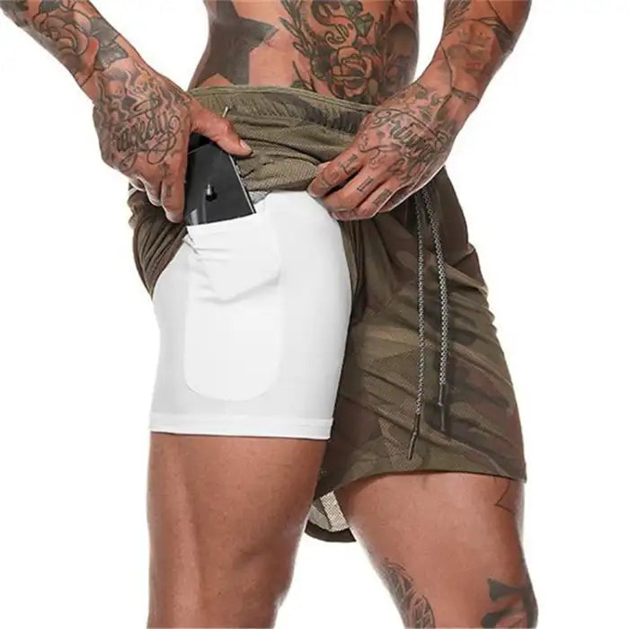  Military green compression shorts with white inner pocket and drawstring waist for workouts.