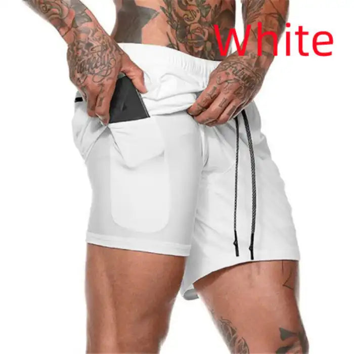  White pocket compression shorts with drawstring waist and thigh phone pocket for active workouts.