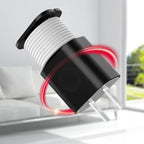 Portable black charger with coiled cord design, featuring anti-tangle functionality for easy storage.
