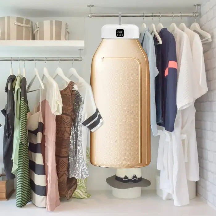 Portable cloth drier used in wardrobe setup among hanging clothes showing easy indoor usability
