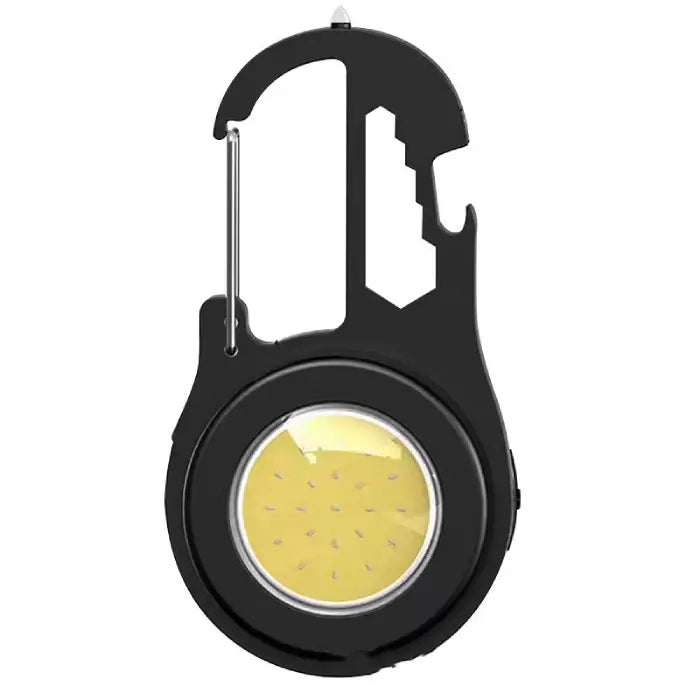 Close-up of black carabiner keychain light featuring yellow COB LED panel and multi-functional design