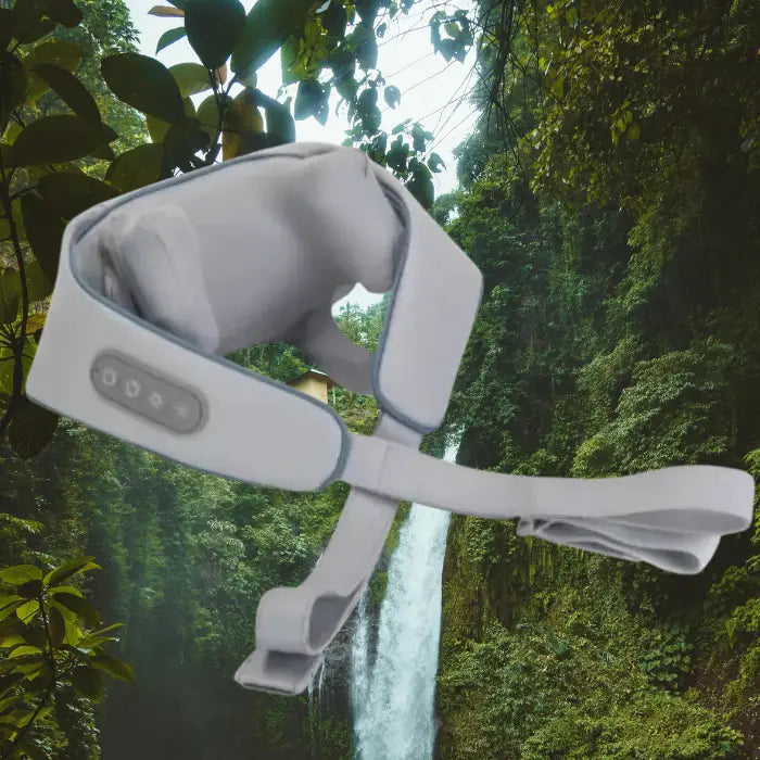 White electronic neck massager device with control panel shown against serene waterfall and green forest backdrop