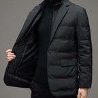 Front-open view of black Puffer Blazer Jacket worn over black turtleneck with buttoned design.