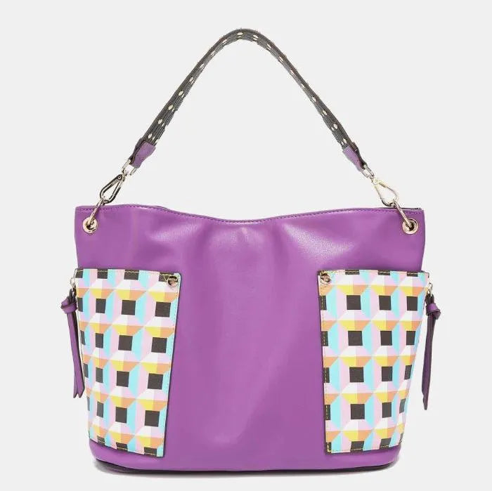 Purple leather hobo bag with pastel geometric panels, studded strap detail, and silver hardware accents