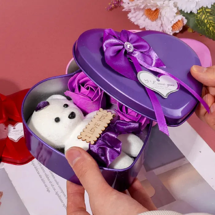 Purple heart-shaped gift box with white teddy bear and artificial roses, decorated with crystal bow