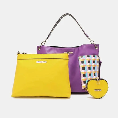 Purple leather handbag set with yellow clutch and geometric pattern detail, featuring coordinated heart-shaped accessory