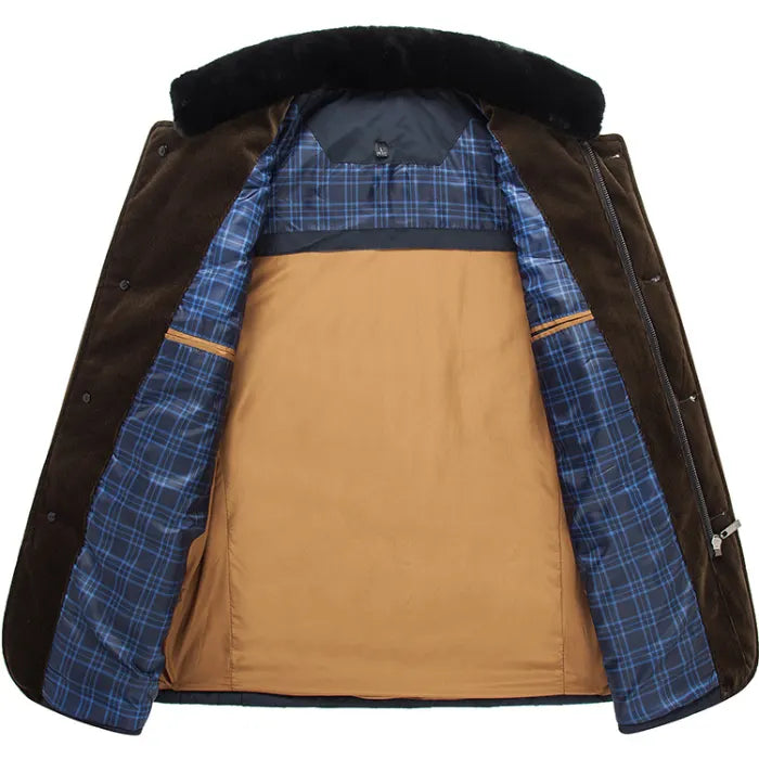 Interior view of quilted insulated jacket featuring plaid lining and soft brown insulation.