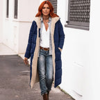 quilted puffer coat in navy worn outdoors, long insulated women’s winter coat combining warmth and style