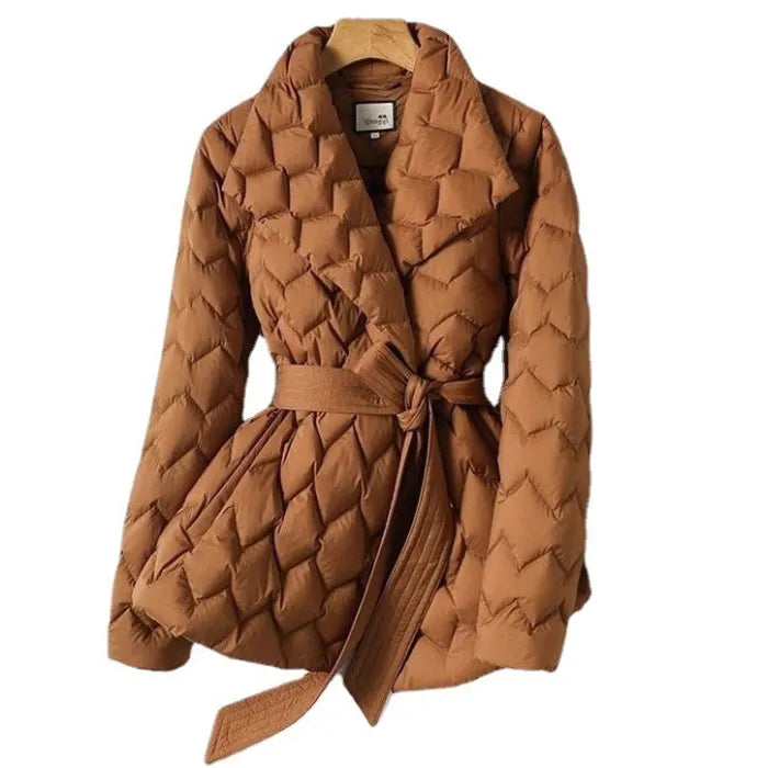 Quilted puffer jacket caramel tone with belted waist and textured padding, offering warm stylish winter coat look for shoppers