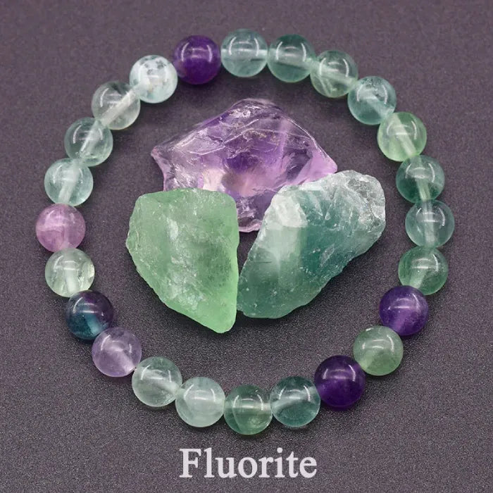 Rainbow Fluorite Crystal Bracelet with raw green and purple stones, polished beads showcasing natural healing energy beauty