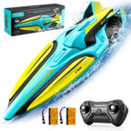 rc speed boat in yellow blue with remote, two batteries and box shown; waterproof high-speed toy for pool or lake fun.!!
