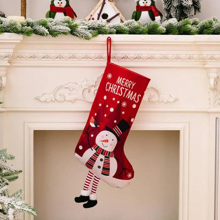 Red Christmas stocking with a cheerful snowman design and striped legs, great for holiday decor.