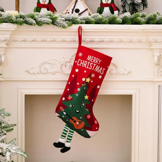 Red Christmas stocking with cute tree character holding a guitar, perfect for holiday mantel decor.