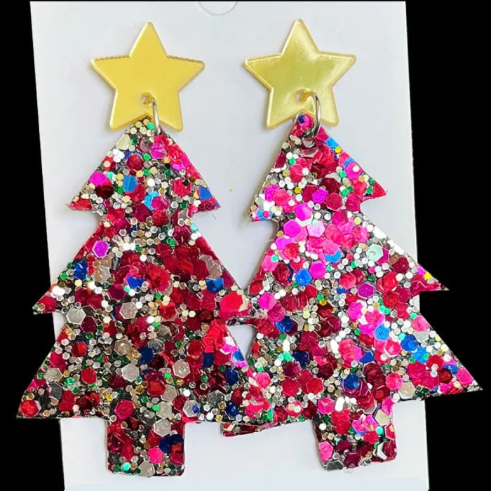 Handmade red glitter Christmas tree earrings with gold star tops, adding sparkle to festive outfits.