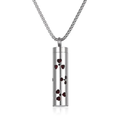 Stainless steel aromatherapy pendant with red heart cutout design for essential oil diffusion necklace.