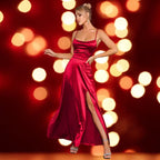 red satin prom dress with spaghetti straps, cowl neckline, and thigh slit, glamorous pose.