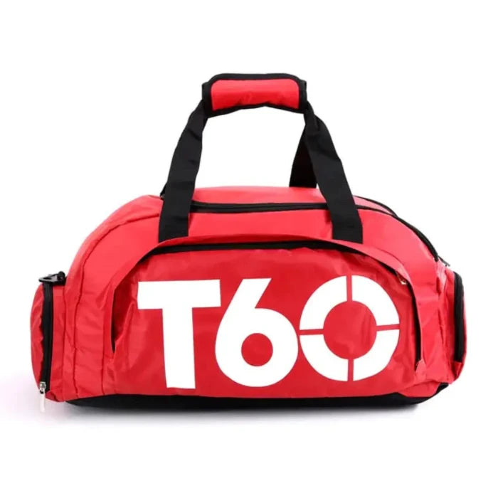 Red sports duffel bag with white logo, black handles, and zipper pockets, suitable for gym or travel use