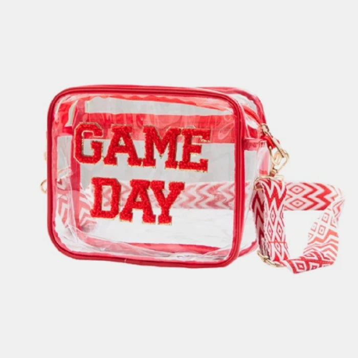 Stadium-approved clear bag with red trim, "GAME DAY" text, and matching red-white patterned shoulder strap for sporting events