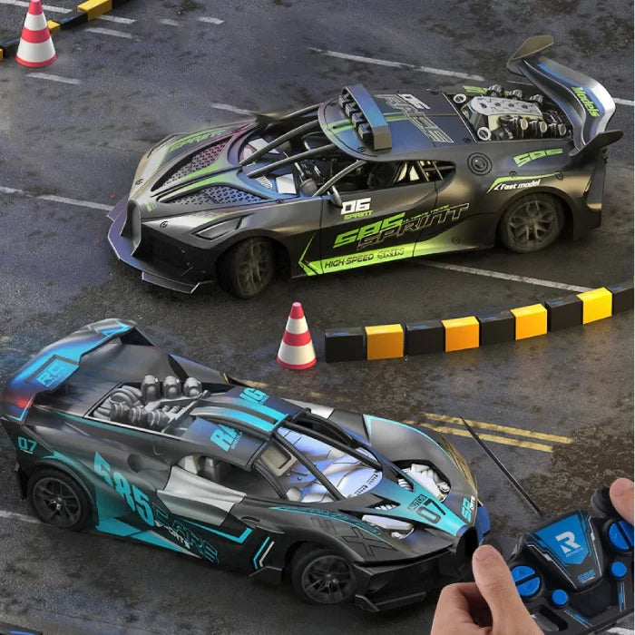 Green and blue remote control racing cars on a miniature track with cones and barriers, being controlled by remotes.