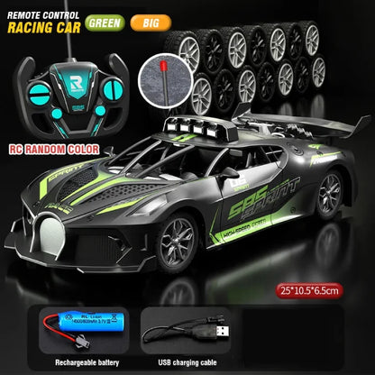 Green large remote control racing car with sporty design, controller, spare tires, battery, and USB charging cable.