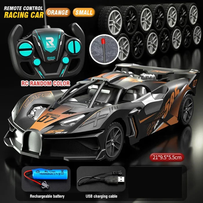 Orange small remote control racing car featuring a modern design, controller, extra wheels, rechargeable battery, and USB cable.