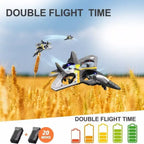 Remote Control Plane with extended battery life flying over wheat field with charge indicator.