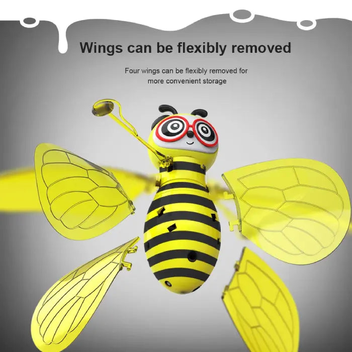 Exploded view of yellow bee robot showing detachable transparent wings system for convenient storage and assembly features