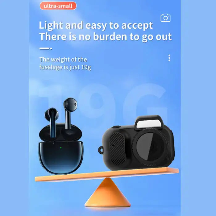Retro Mini Camera shown on balance scale beside earbuds, highlighting its 19g lightweight body.