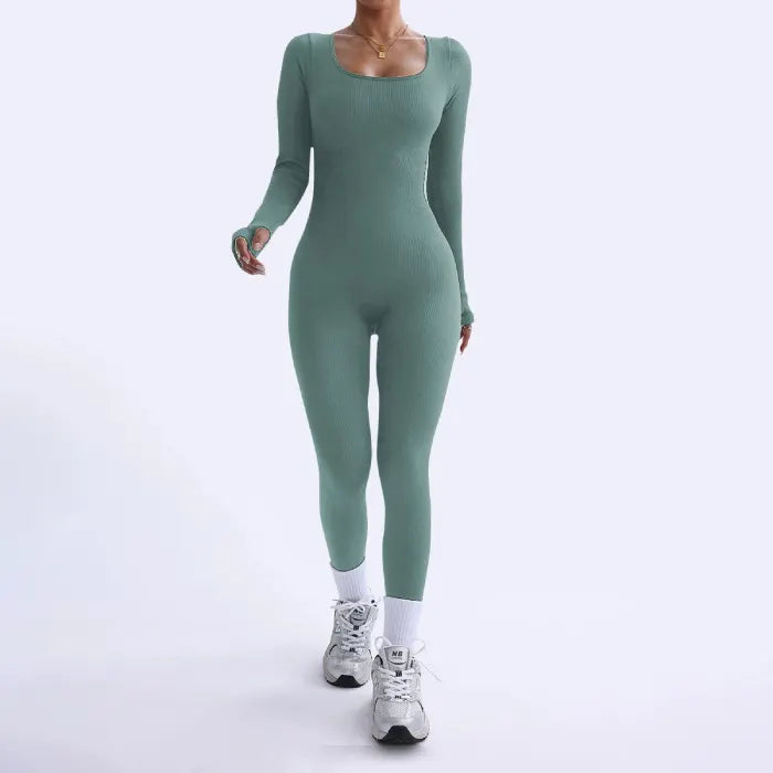 Ribbed knit jumpsuit in calm sage green with long sleeves, offering a seamless one-piece outfit ideal for relaxed and stylish daily wear