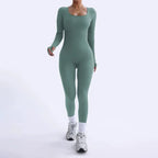 Ribbed knit jumpsuit in calm sage green with long sleeves, offering a seamless one-piece outfit ideal for relaxed and stylish daily wear