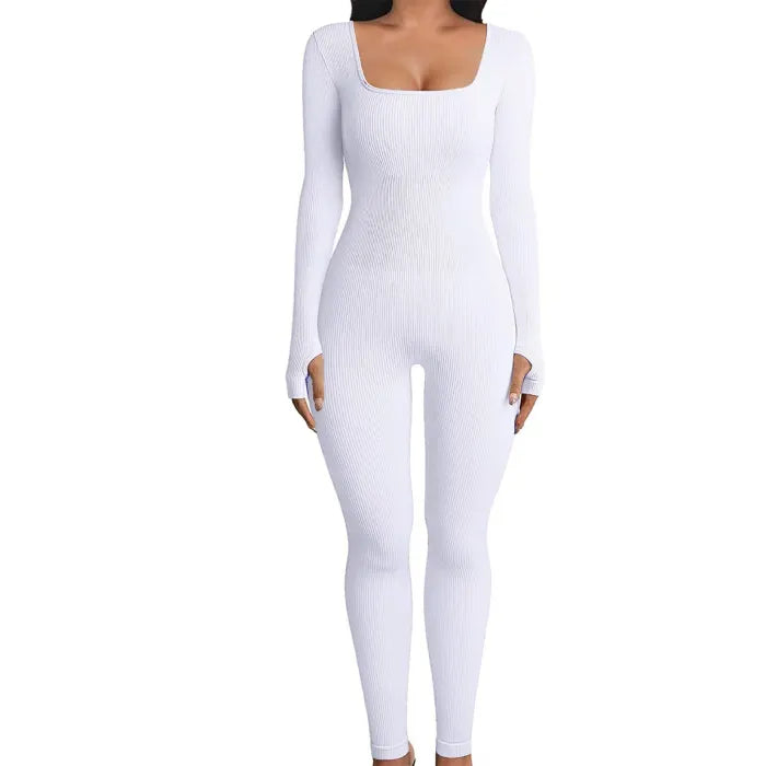 Ribbed knit jumpsuit in fresh white displayed in a front product pose, emphasizing seamless one-piece outfit suited for crisp, modern styling