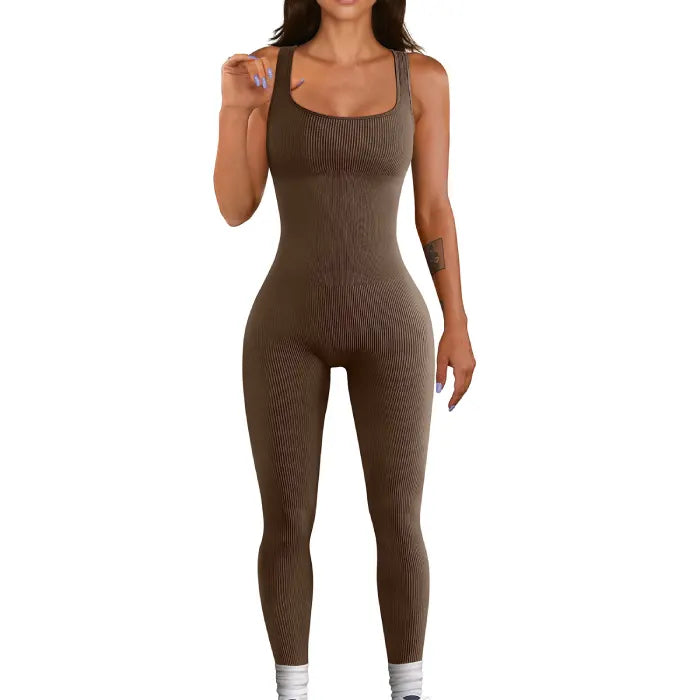 Dark brown ribbed knit jumpsuit shown on a model standing against a white backdrop.