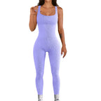 Lavender ribbed knit jumpsuit with a stretchy, sculpting fabric design.