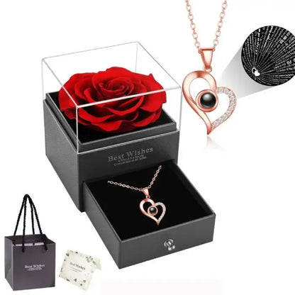 Romantic gift set featuring a heart pendant and preserved rose.