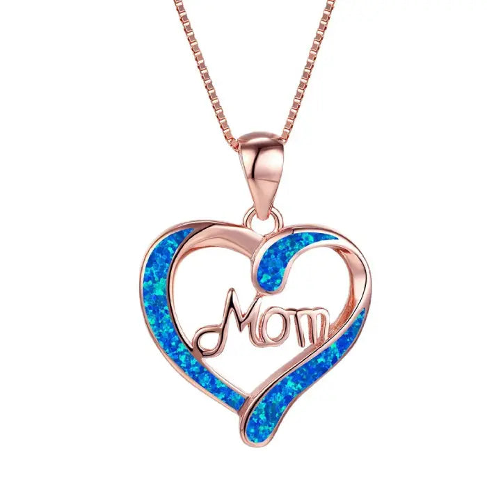 Beautiful rose gold mom heart pendant with blue opal accents, a heartfelt Mother’s Day jewelry piece.