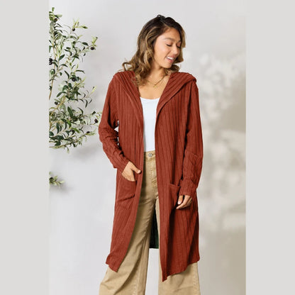 Terracotta ribbed long cardigan with hood styled with khaki pants and white tank for modern minimalist fall fashion