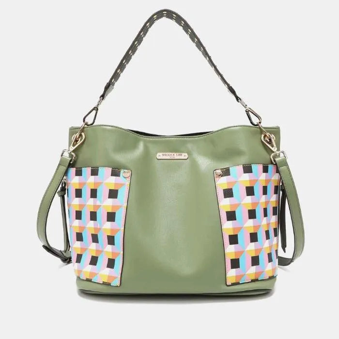 Sage green leather handbag featuring geometric pattern panels, studded strap, and versatile carrying design