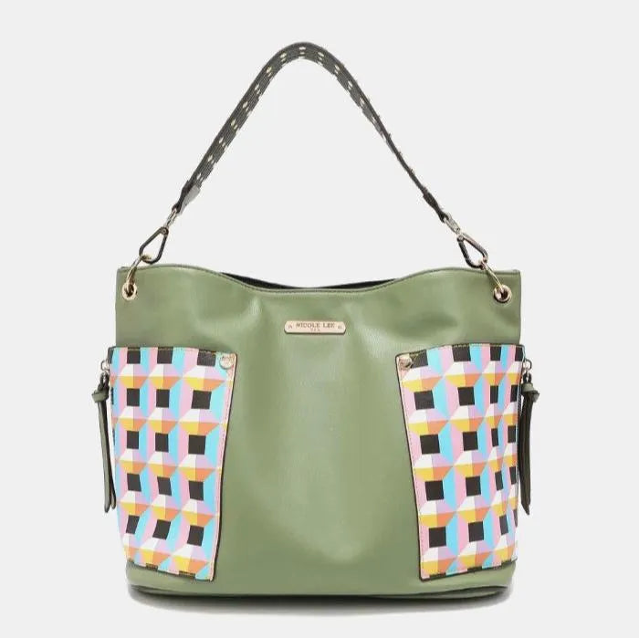 Stylish sage green shoulder bag with pastel geometric pattern panels and studded strap, featuring modern color-block design