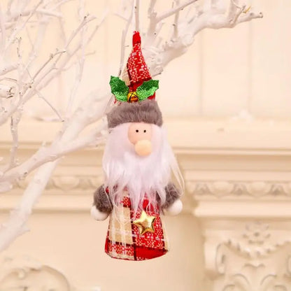 Santa gnome Christmas ornament with white beard, red hat, and plaid outfit hanging on white tree branch