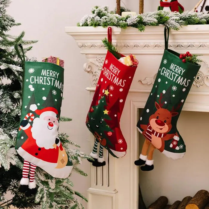 Santa, tree, and reindeer Christmas stockings hanging on a beautifully decorated mantelpiece.