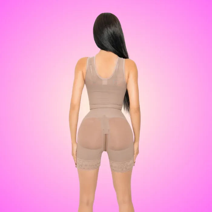 Sculpting Bodysuit back view on pink background showing lace-trim shorts and contoured shaping design.