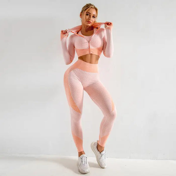 Three-piece seamless yoga set for women in peach and white with high-waisted leggings.