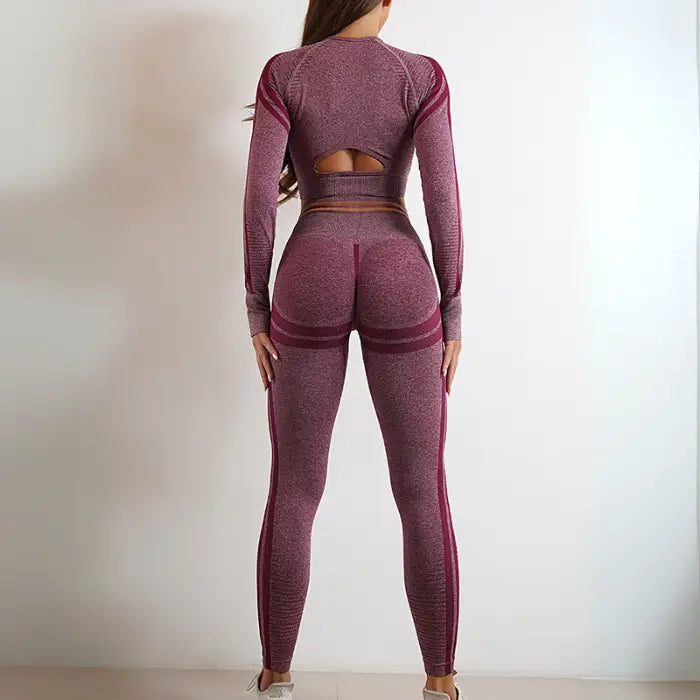 Full back view of purple seamless yoga outfit with high-rise leggings and long sleeves