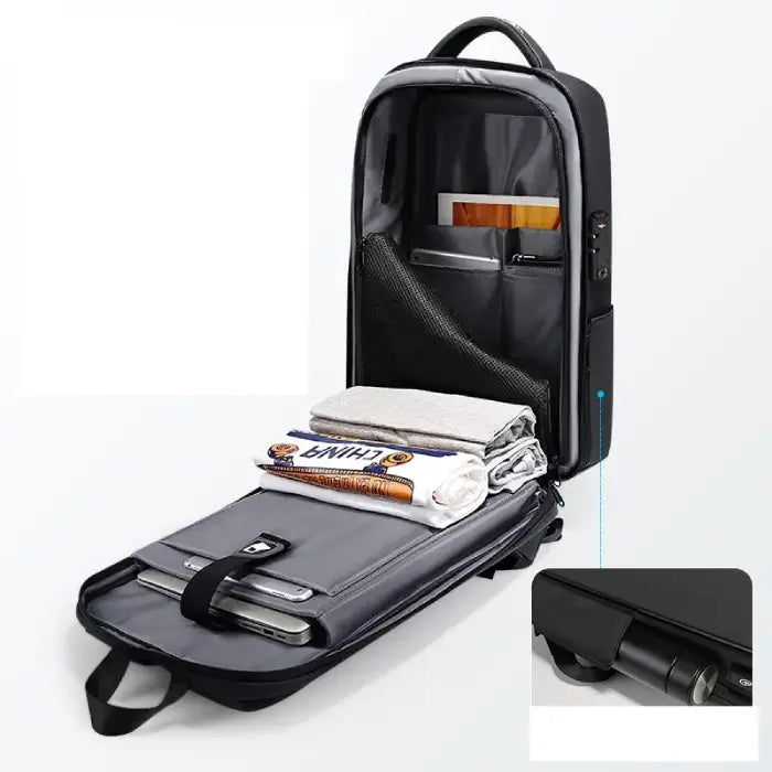 Laptop backpack interior with TSA lock, multiple compartments, side pockets, and space for clothes and electronics