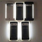 Selfie case lineup featuring black and white phone covers with built-in LED lighting for selfies.