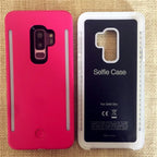 Selfie case for Samsung S9 Plus in vibrant pink and clear design with vertical LED light strips.