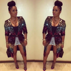 sequin-duster-rainbow fashion look indoors, belted multicolor sequin coat paired with heels for confident style